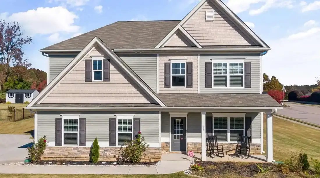 Behind on mortgage payments Texas – two-story house with a front porch