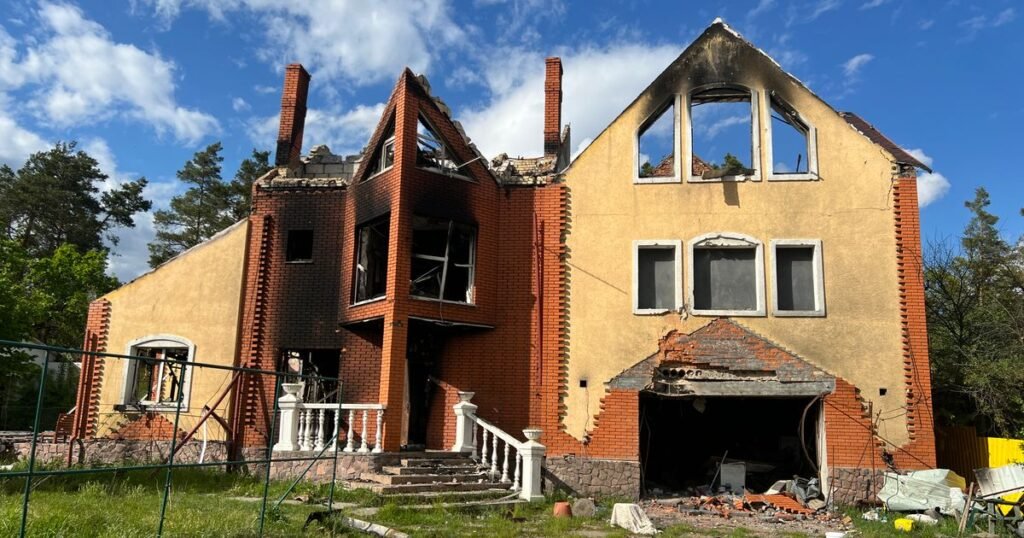 Sell fire damaged house Texas – brick house with fire damage to the roof and upper floor