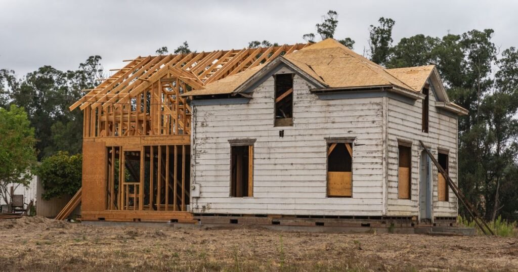 Sell house without repairs Dallas – older house with new framing during a renovation