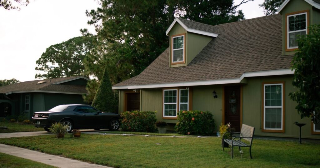 Sell rental property with tenants Texas – single-family rental house with a car in the driveway