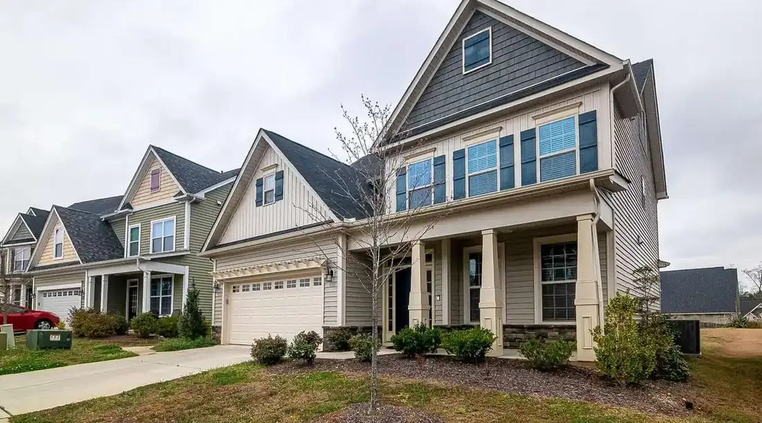 Cash home buyers Irving TX – suburban home with a covered front porch