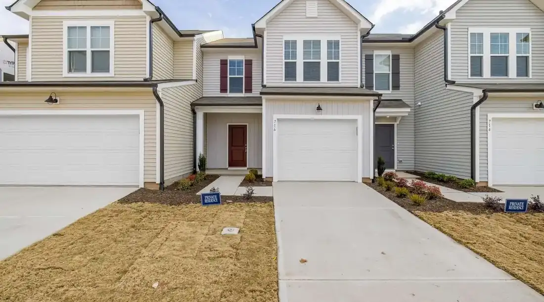 Sell rental property with tenants Texas – row of townhomes with driveways